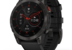 a black watch with a red and black face